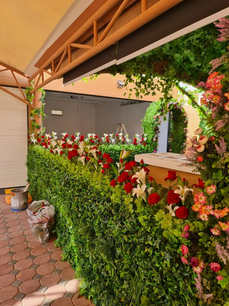 Real completed project: The floral hedge archway at the event entrance.